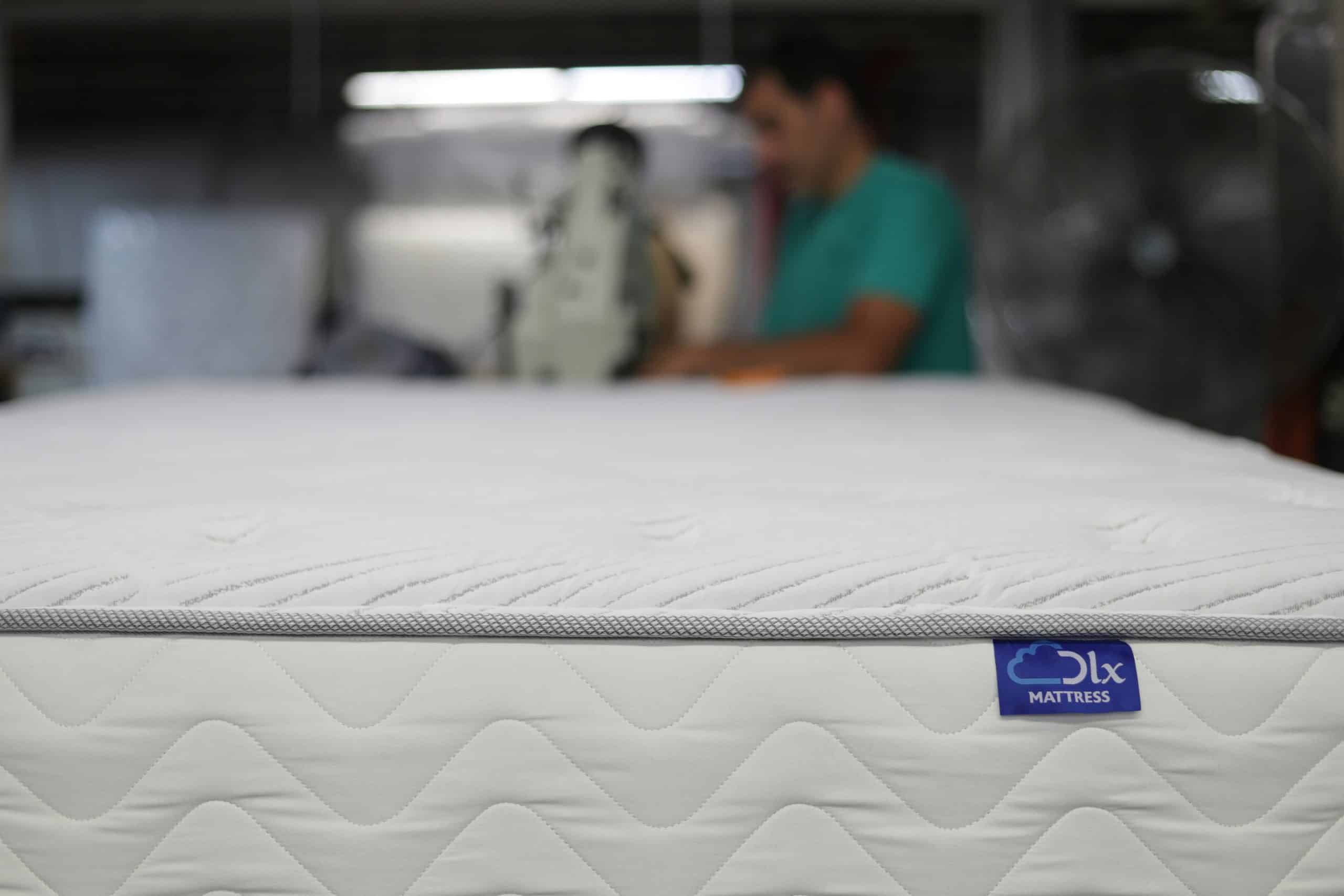 dlx mattress flh0I0zlQiw unsplash scaled